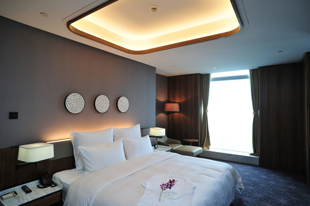 Chongqing The Lotus Hotel Exterior foto